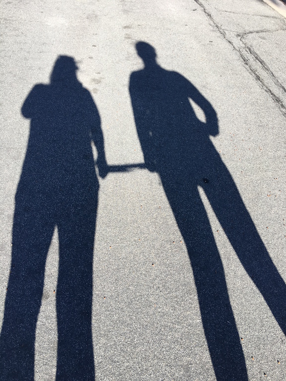 Maria and her guide walker tethered together